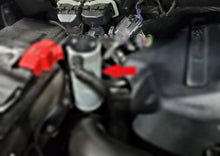 Load image into Gallery viewer, J&amp;L 11-19 Ford F-150 2.7L/3.5L/5.0L Passenger Side Oil Separator 3.0 Cannister Extension - Clear JLTEXT-C
