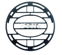 Load image into Gallery viewer, Hella Stone Shield Round Plastic Black Hella Logo Light Cover HELLA148995001