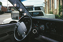 Load image into Gallery viewer, 2-1/16in Triple Gauge Pod- 94-97 Dodge Ram - AutoMeter 17201
