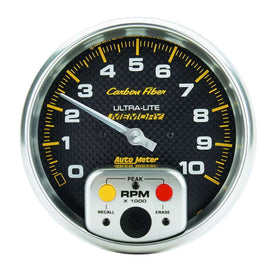 AutoMeter GAUGE; TACHOMETER; 5in.; 10K RPM; IN-DASH W/PEAK MEMORY; CARBON FIBER