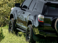 Load image into Gallery viewer, 10-21 Toyota 4Runner Step Edition Bolt On Rock Sliders Kick Out Bed Liner Filler Plate Powder Coat Cali Raised LED