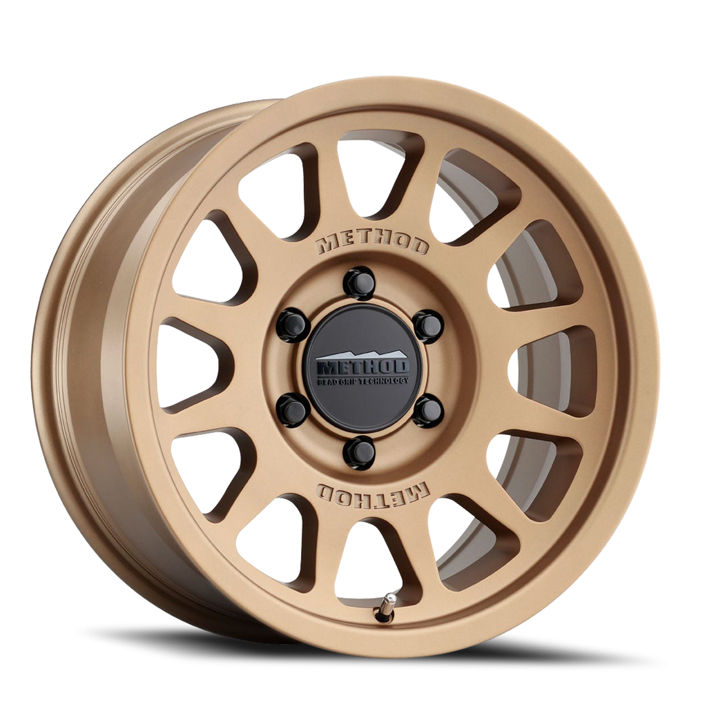 Aluminum Wheels 17x8.5 Bead Grip MR703 Bolt Pattern 6 On 139.7 Offset 0 Lip Size 1.18 Method Bronze BRZ Method